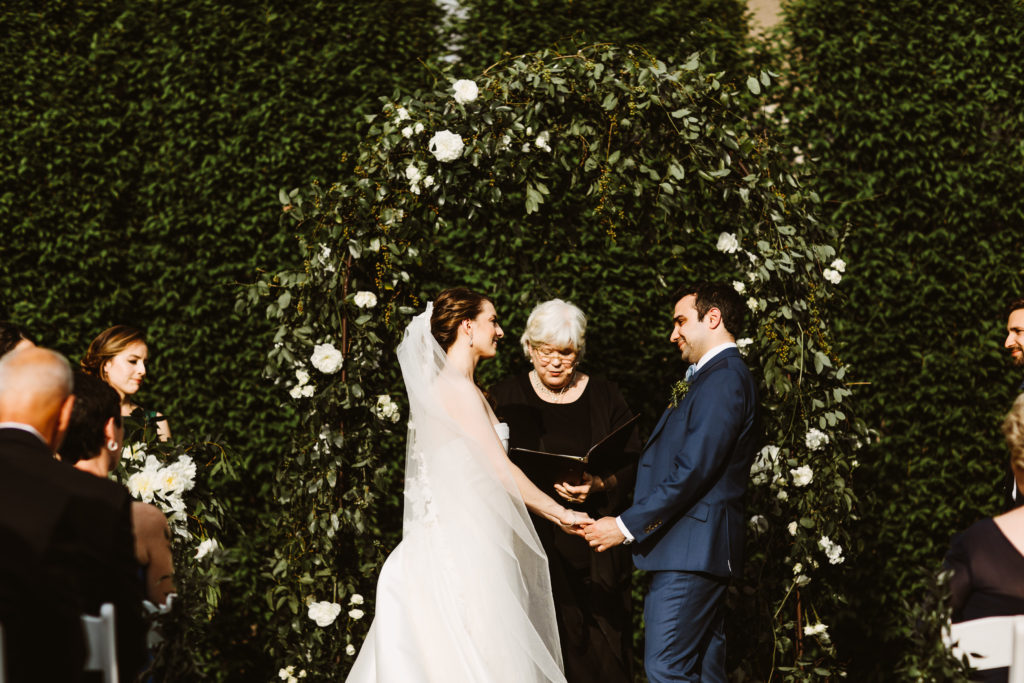 Roundhouse wedding flowers ceremony arch